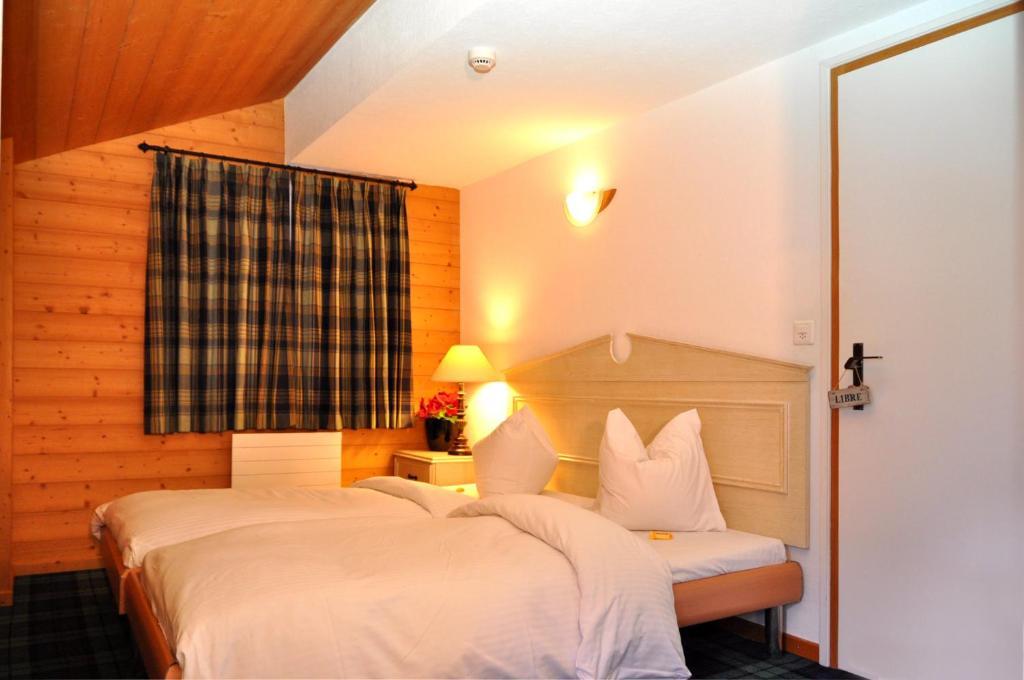 Hotel De La Paix Champéry Quarto foto